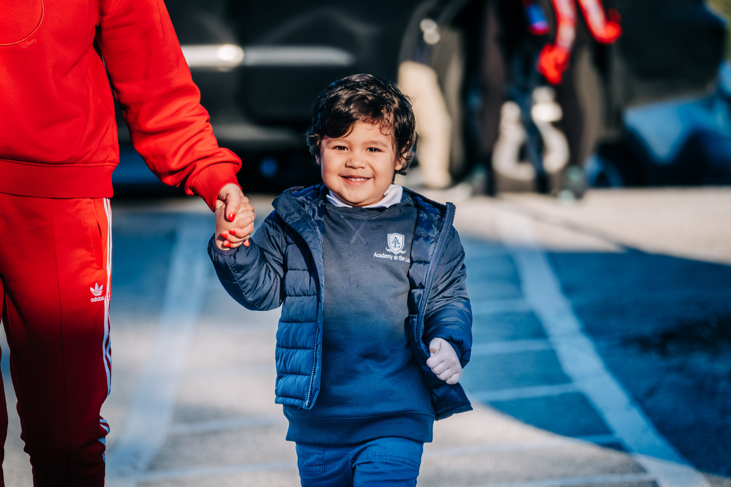 Early childhood student walking confidently on campus