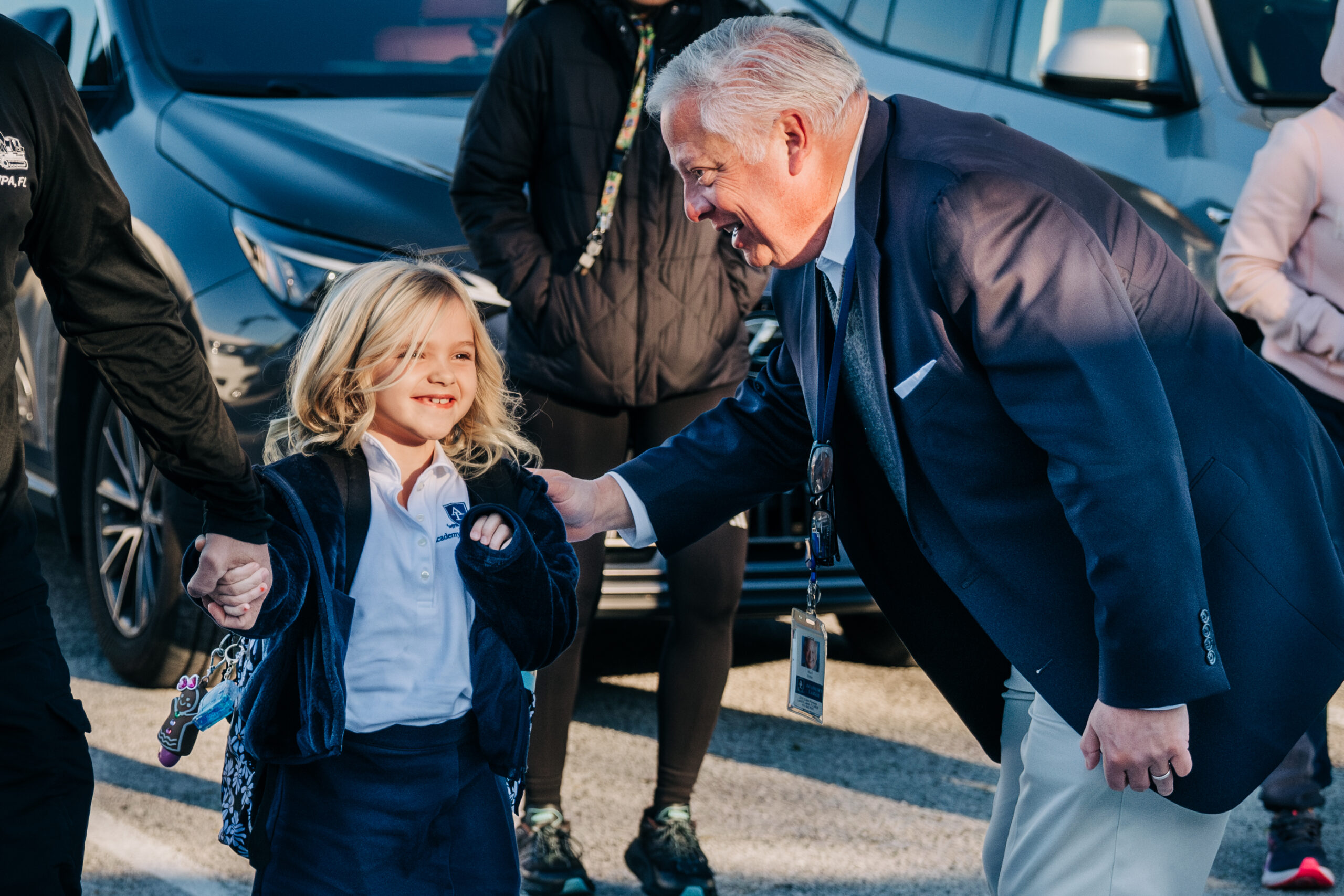 Head of School greeting Lower Division student